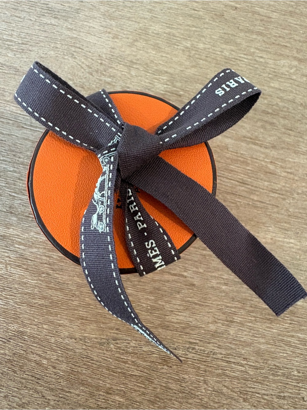 Hermes Orange Round Box with Brown Ribbon